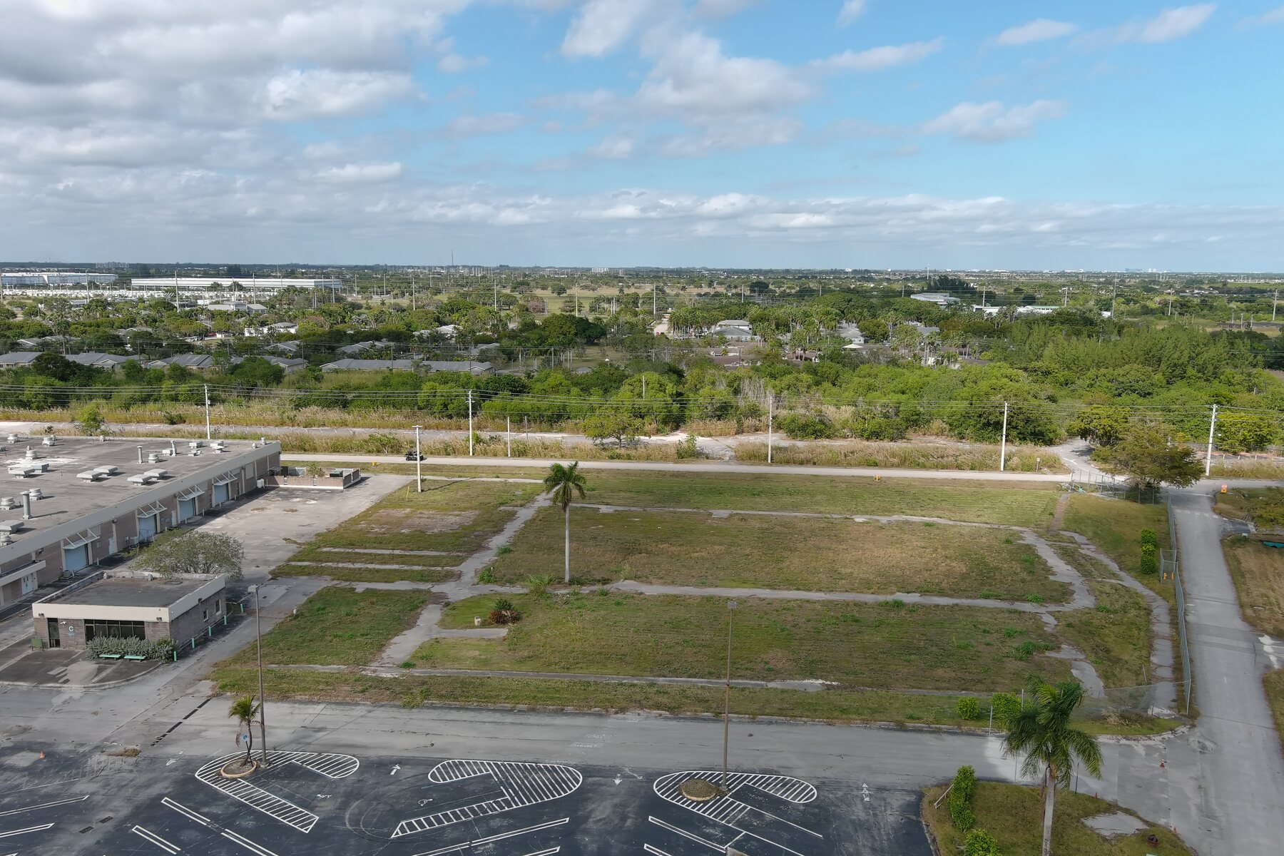 Vacant and underutilized parcels within the CRA — the redevelopment runway. Aerial, BusinessFlare®.